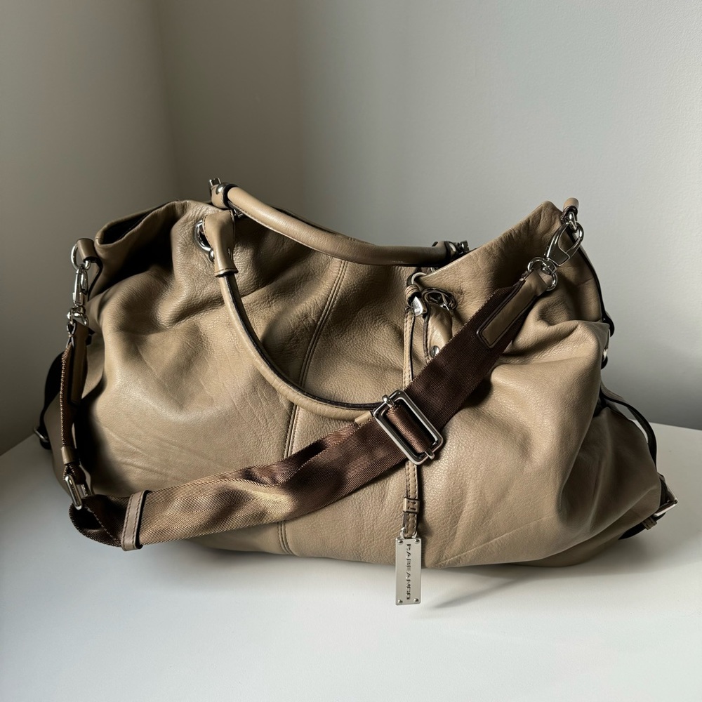 Genuine leather travel duffle with a hobo style slouch